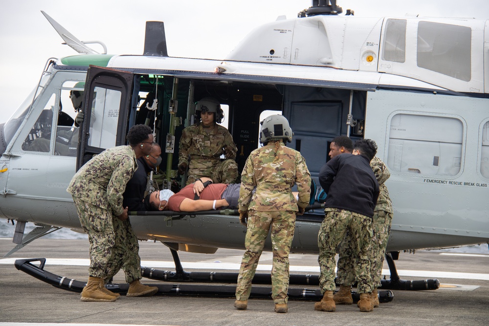 USNMRTC Yokosuka and Yokota Air Base Staff Education and Training (SEAT) partner to perform UH-1N helicopter mass casualty drill components