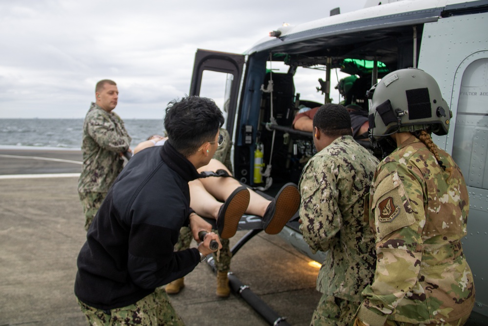 USNMRTC Yokosuka and Yokota Air Base Staff Education and Training (SEAT) partner to perform UH-1N helicopter mass casualty drill components