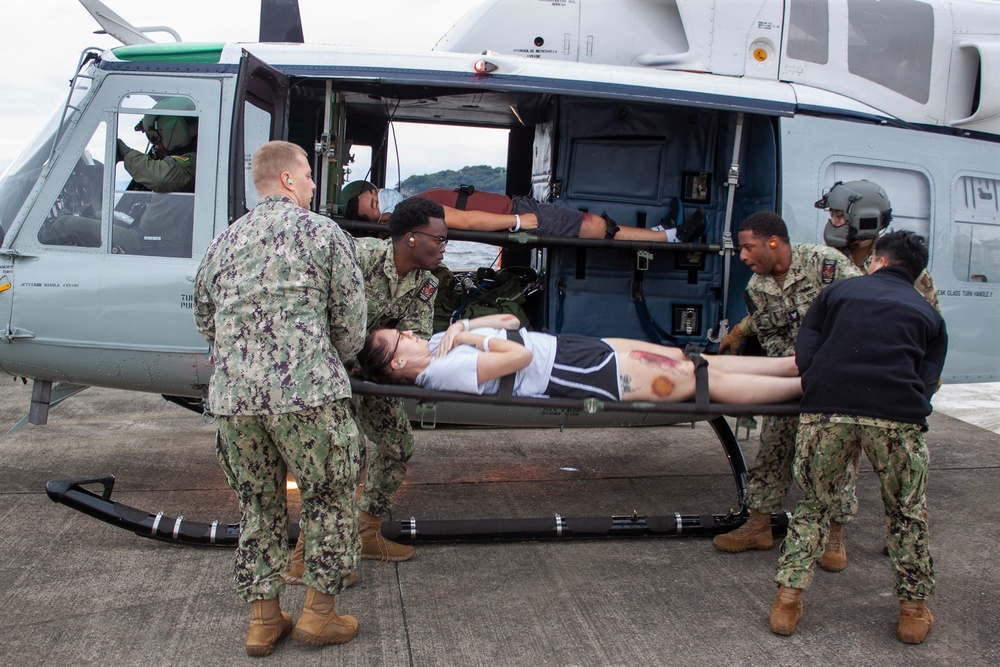 USNMRTC Yokosuka and Yokota Air Base Staff Education and Training (SEAT) partner to perform UH-1N helicopter mass casualty drill components