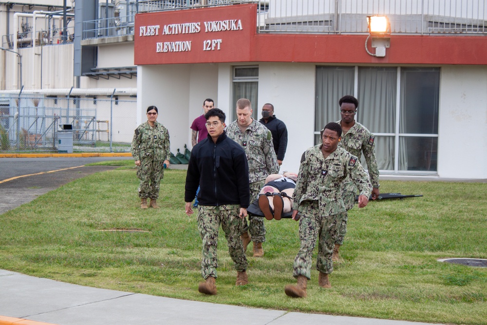 USNMRTC Yokosuka and Yokota Air Base Staff Education and Training (SEAT) partner to perform UH-1N helicopter mass casualty drill components