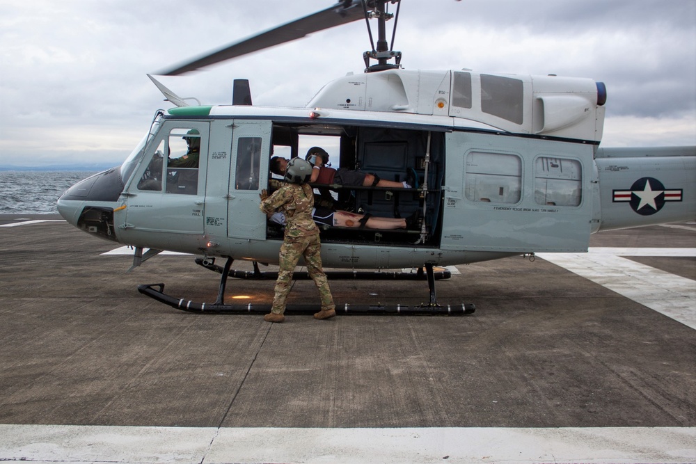 USNMRTC Yokosuka and Yokota Air Base Staff Education and Training (SEAT) partner to perform UH-1N helicopter mass casualty drill components