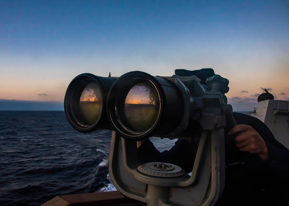 U.S. Sailor Stands A Lookout Watch