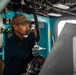 U.S. Navy Sailor Mans The Helm