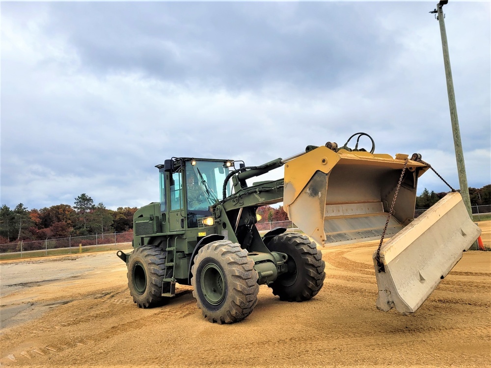 Engineers with Wisconsin National Guard’s 173rd Engineer Company work on McCoy troop project