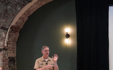 Rear Adm. Michael Wettlaufer, commander, Military Sealift Command (MSC), speaks at the 2022 National Defense Transportation Association – U.S. Transportation Command Fall Meeting
