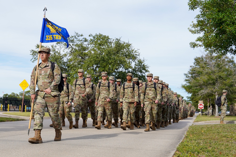 Technical training students marching