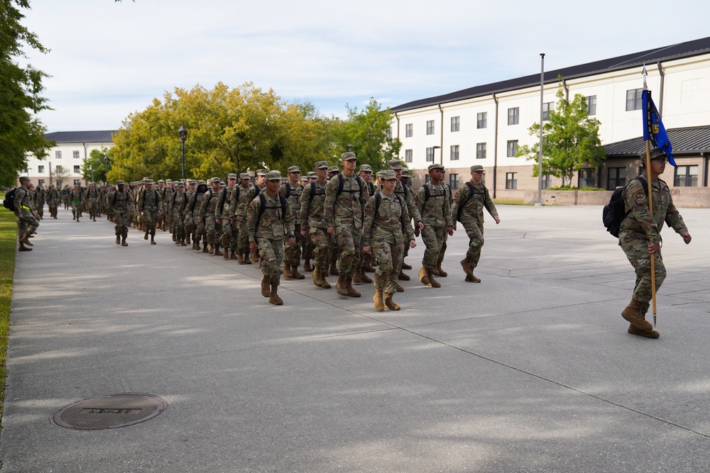 Technical training students marching