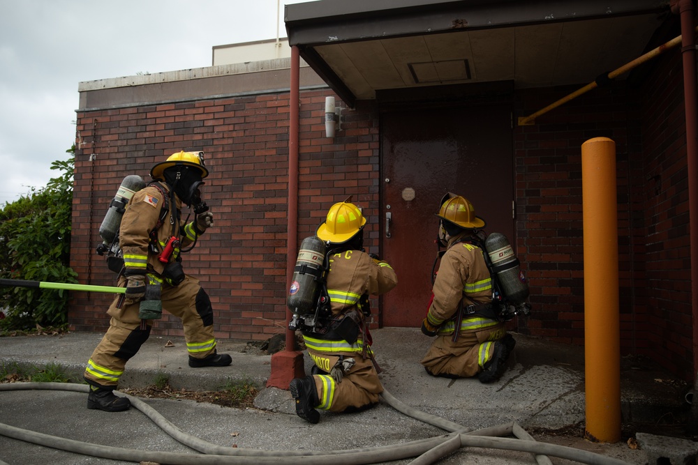 Urasoe Fire Department Rescue Team and MCIPAC Fire and Emergency Services conduct bilateral training