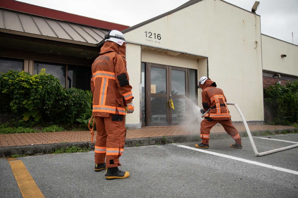 Urasoe Fire Department Rescue Team and MCIPAC Fire and Emergency Services conduct bilateral training