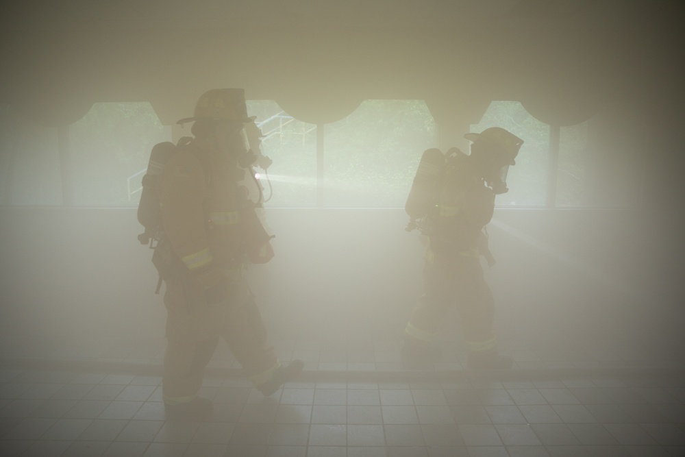 Urasoe Fire Department Rescue Team and MCIPAC Fire and Emergency Services conduct bilateral training