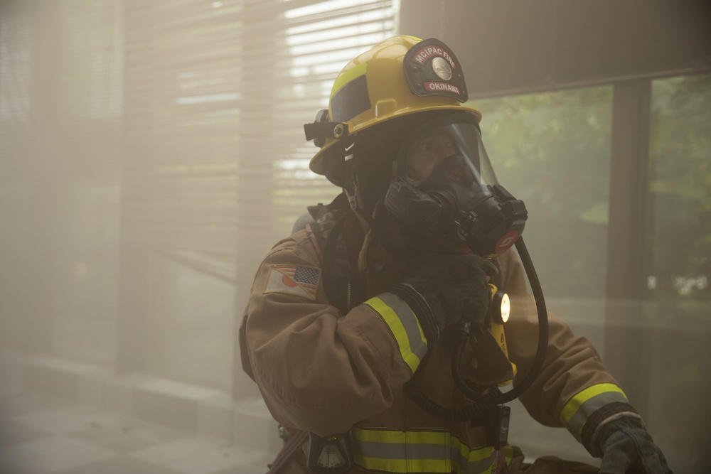 Urasoe Fire Department Rescue Team and MCIPAC Fire and Emergency Services conduct bilateral training