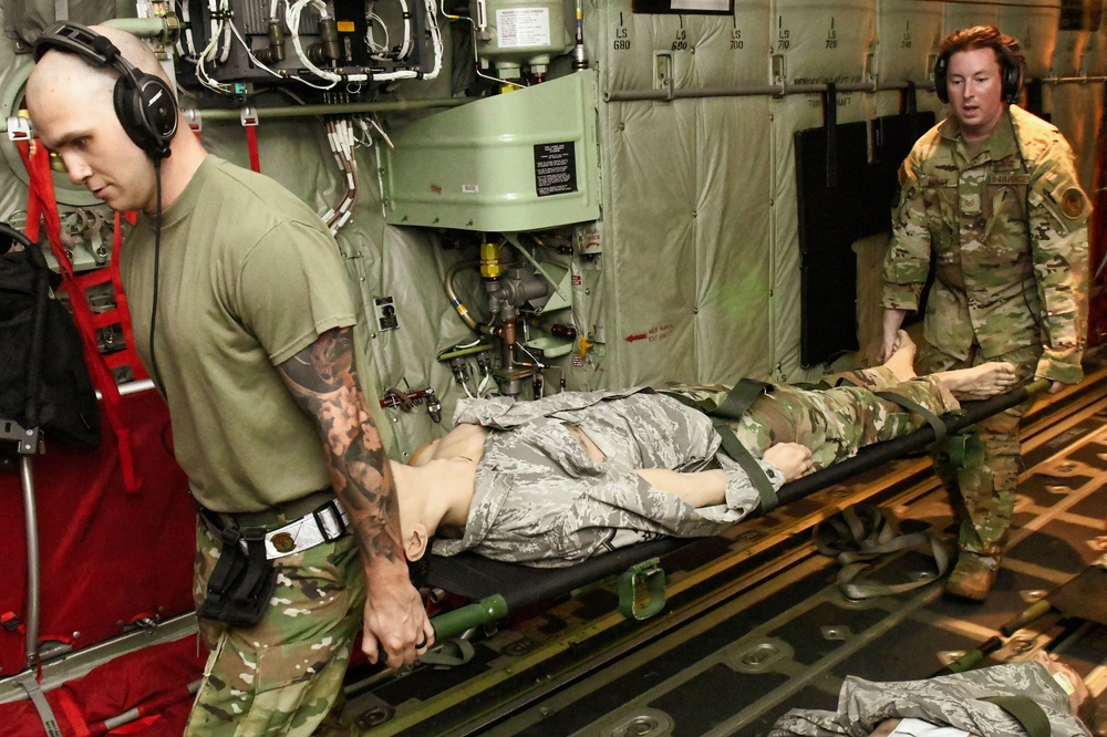 Yokota Airmen simulate mass casualty aeromedical evacuation