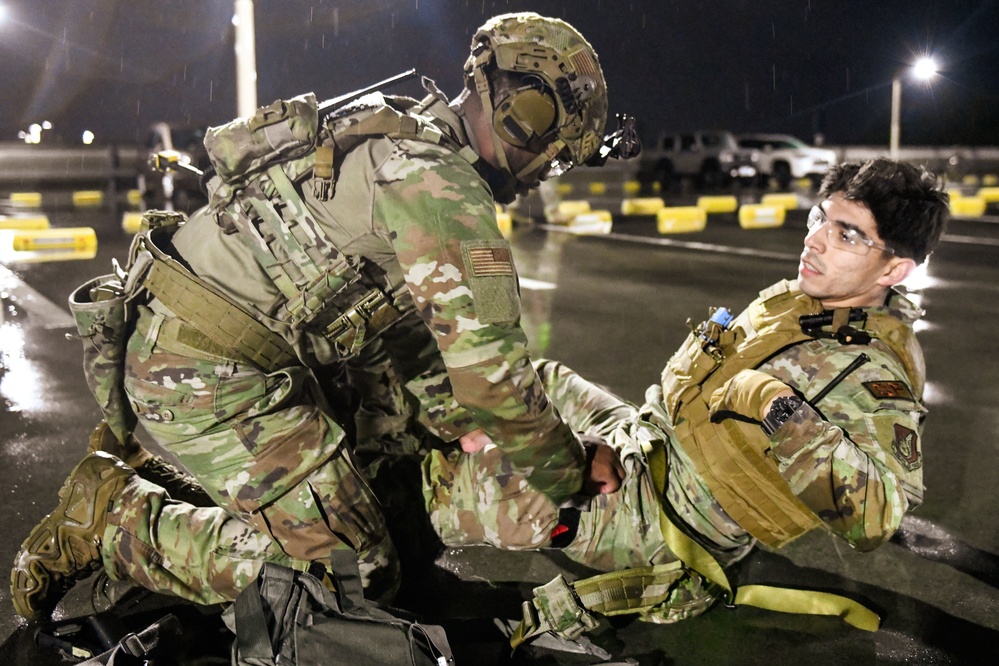 374th SFS respond to simulated opposing forces during SRI