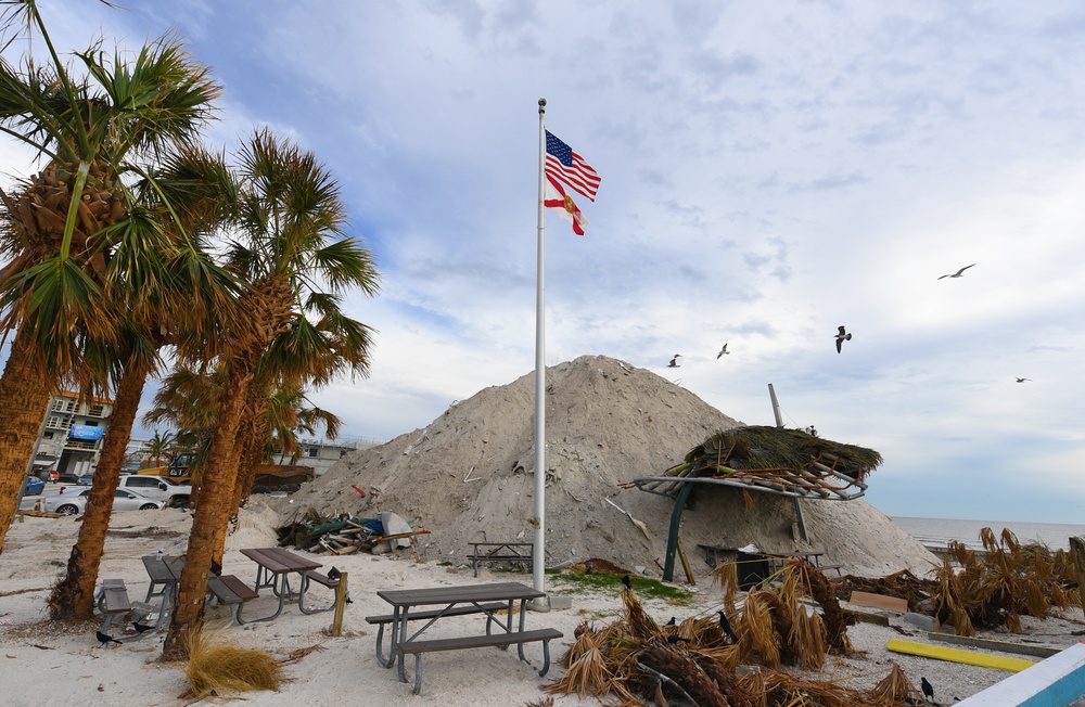 A Flag Blows in the Wind at Fort Myers Beach