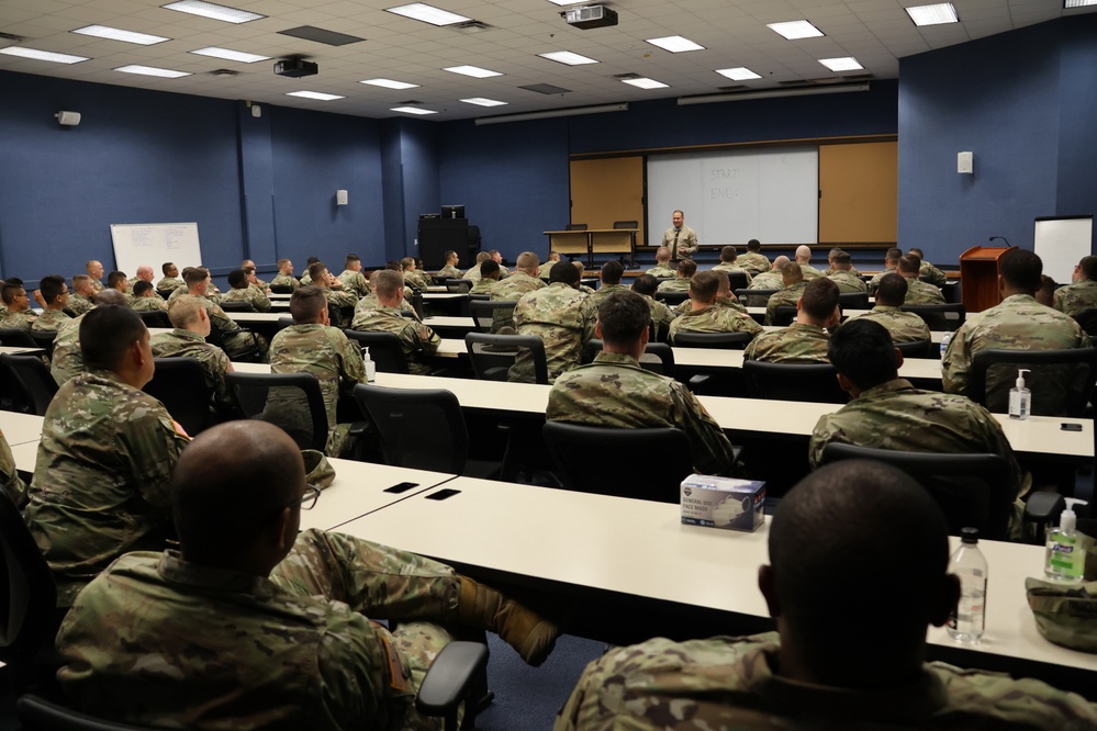 Packed room of NCOs