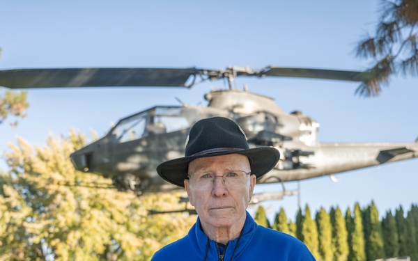 Vietnam veterans visit old AH-1 Cobra on Gowen Field