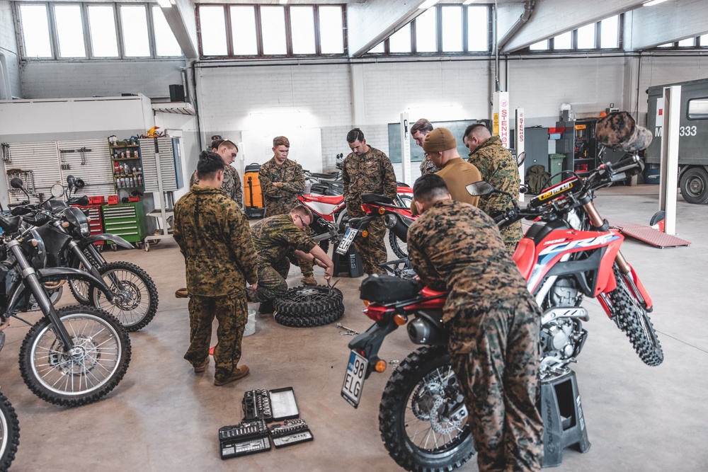 U.S. Marines with Combat Logistics Battalion 6 participate in Finnish dirt bike course