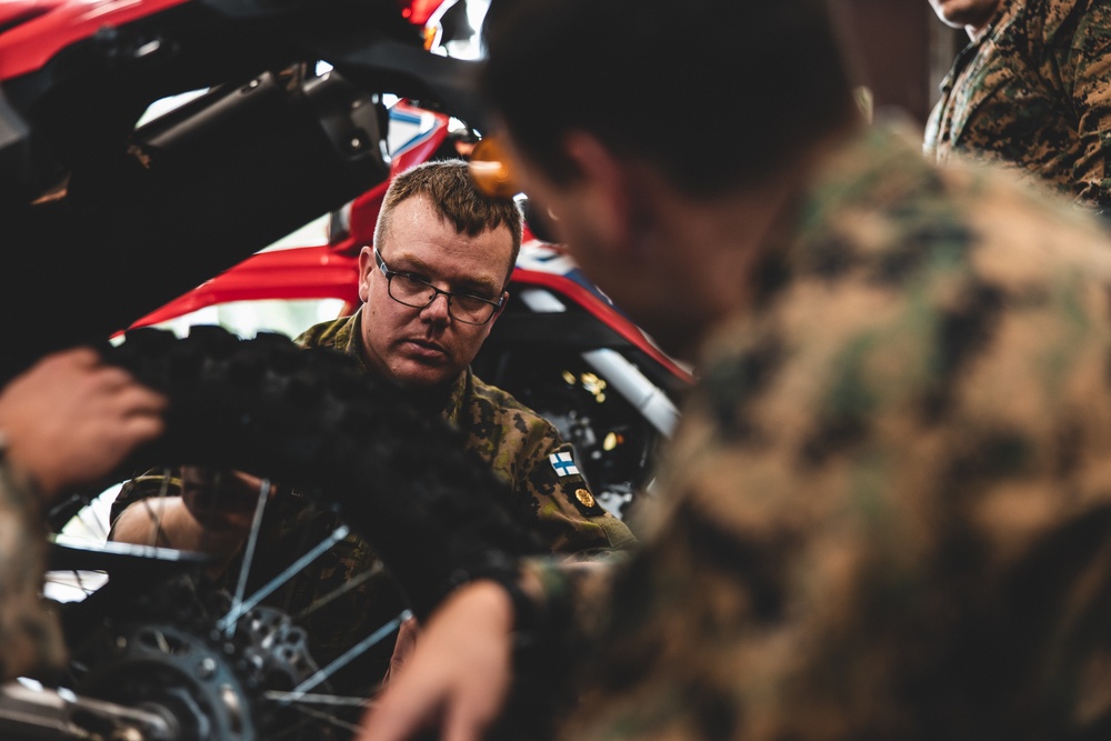 U.S. Marines with Combat Logistics Battalion 6 participate in Finnish dirt bike course