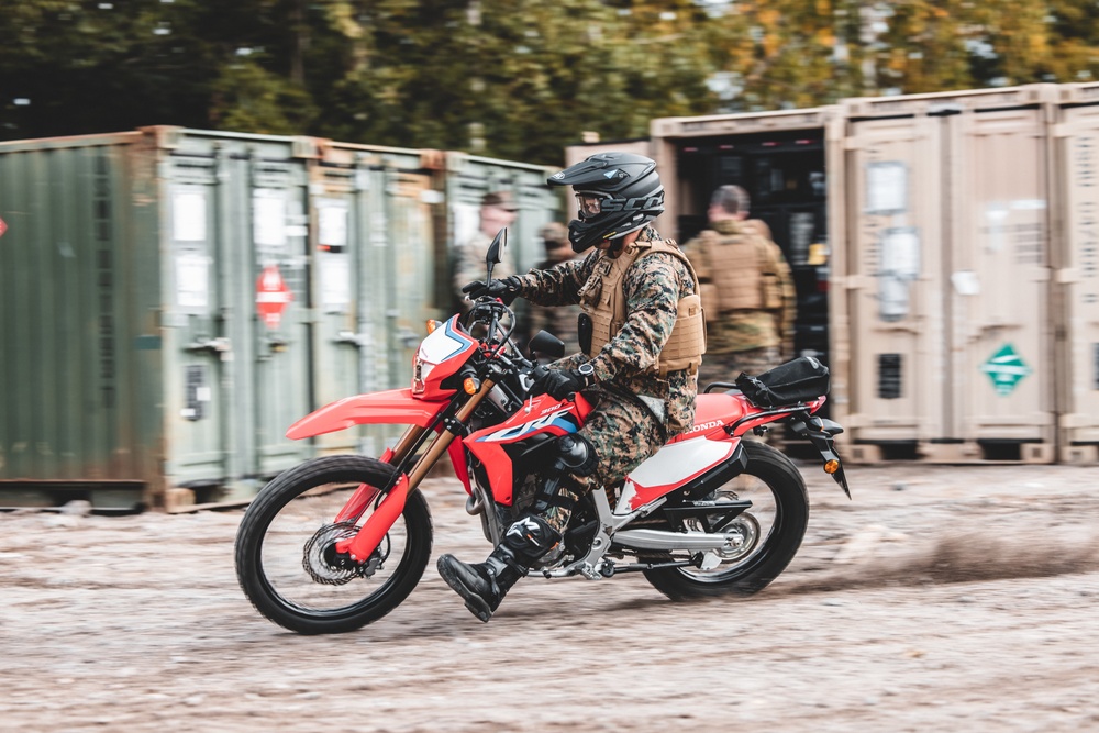 U.S. Marines with Combat Logistics Battalion 6 participate in Finnish dirt bike course