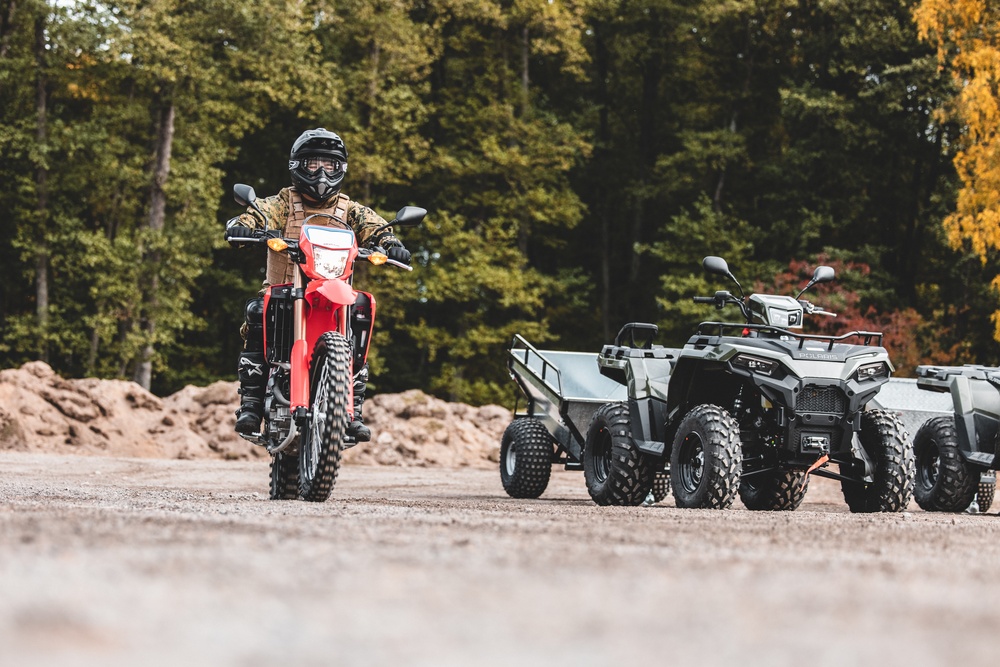 U.S. Marines with Combat Logistics Battalion 6 participate in Finnish dirt bike course