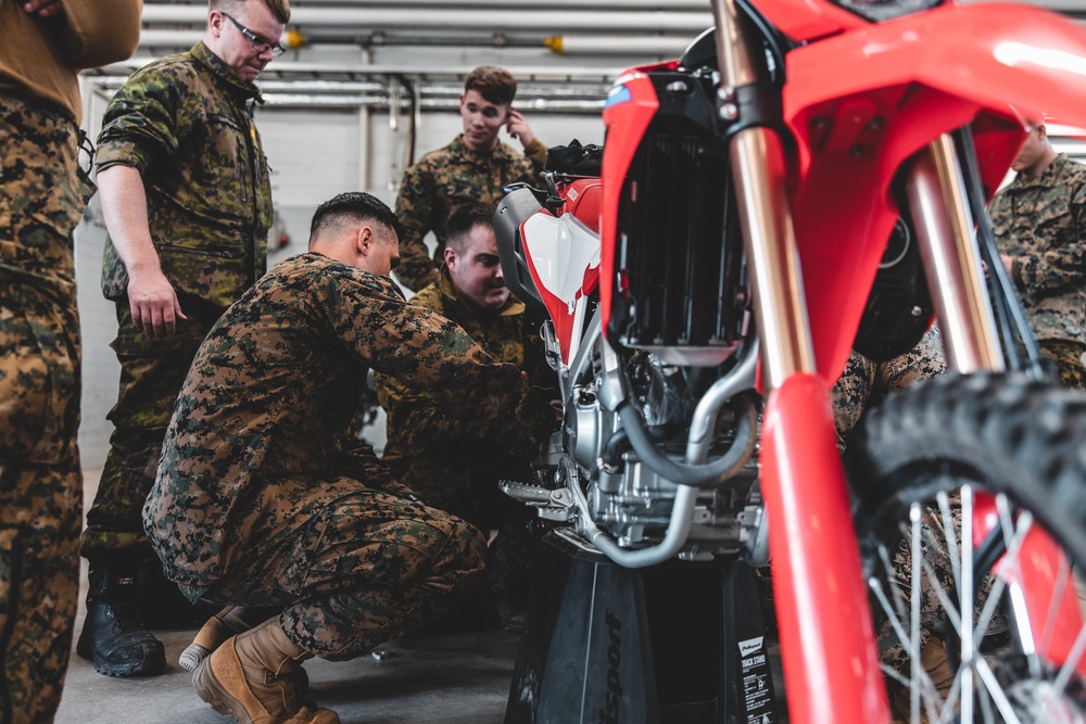 U.S. Marines with Combat Logistics Battalion 6 participate in Finnish dirt bike course