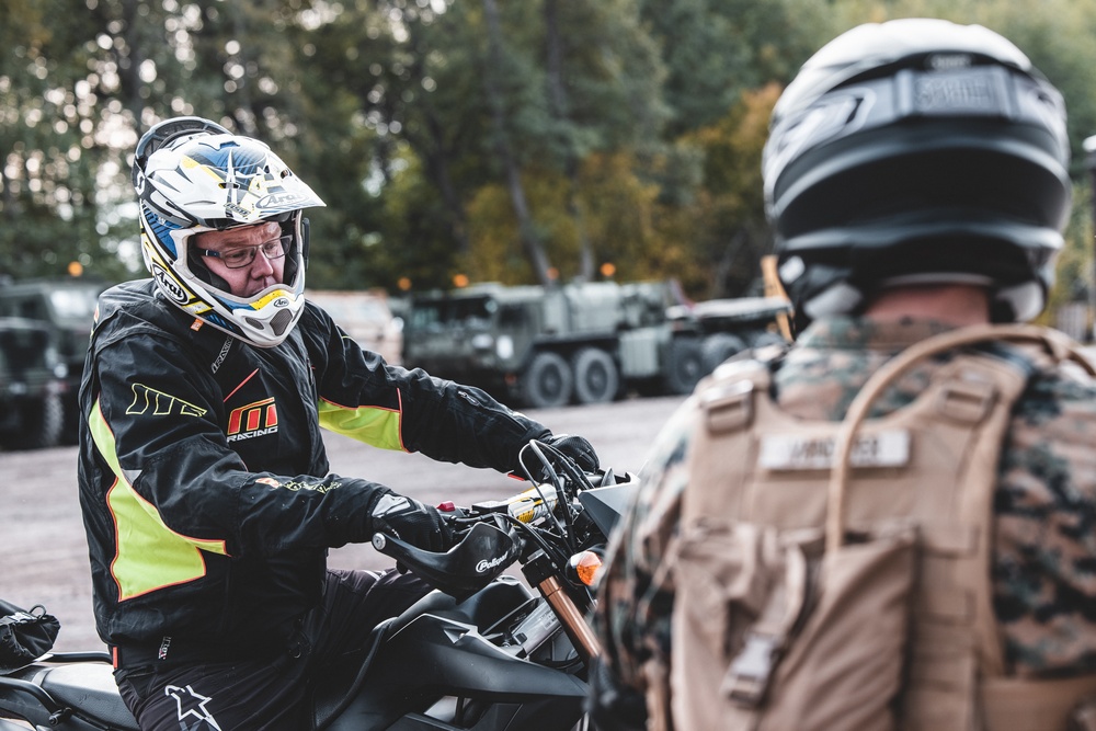 U.S. Marines with Combat Logistics Battalion 6 participate in Finnish dirt bike course