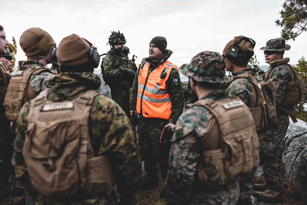 U.S. Marines with Combat Logistics Battalion 6 conduct a littoral reconnaissance range with Finnish Soldiers