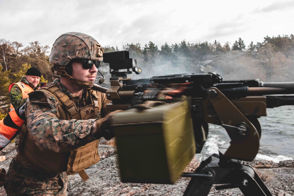 U.S. Marines with Combat Logistics Battalion 6 conduct a littoral reconnaissance range with Finnish Soldiers