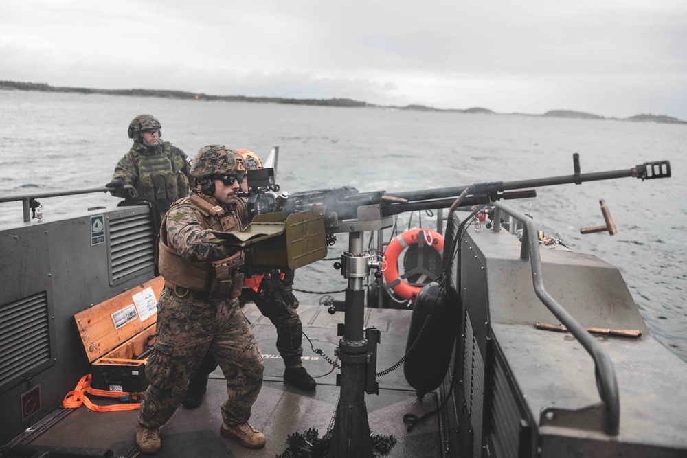 U.S. Marines with Combat Logistics Battalion 6 conduct a littoral reconnaissance range with Finnish Soldiers