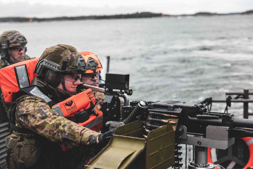 U.S. Marines with Combat Logistics Battalion 6 conduct a littoral reconnaissance range with Finnish Soldiers