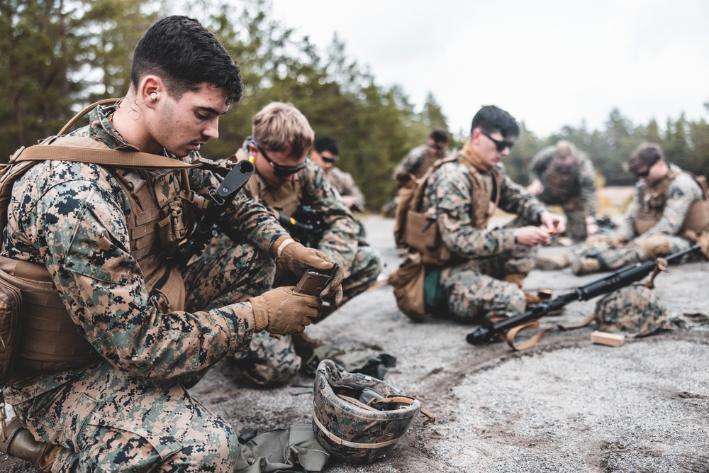 U.S. Marines with Combat Logistics Battalion 6 conduct table 5 and 6 range