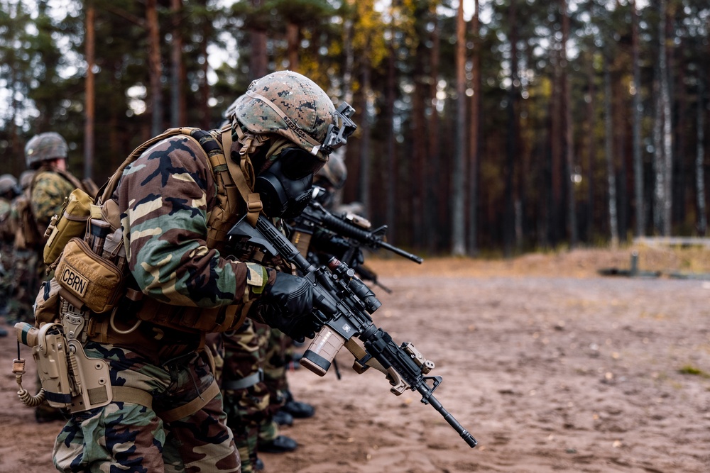 U.S. Marines with Combat Logistics Battalion 6 conduct a barricade and Chemical Biological Radiological and Nuclear range