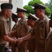 Cheif Construction Mechanic Michael Cornett being congratulated after the Cheif Petty Officer Pinning Ceremony.