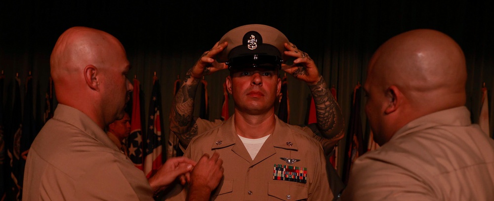 Cheif Aviation Machinist's Mate William Owens, being frocked to Cheif Petty Officer during The Pinning Ceremony.