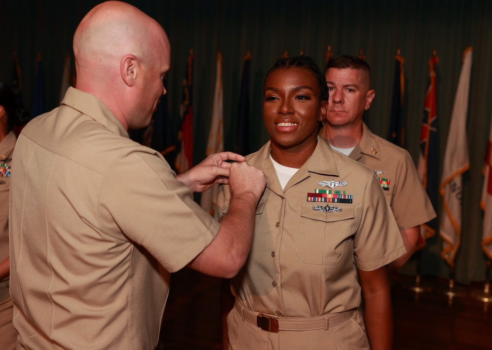 Chief Information Systems Technician Amanda Copeland, being frocked during The Cheif Petty Officer Pinning Ceremony.