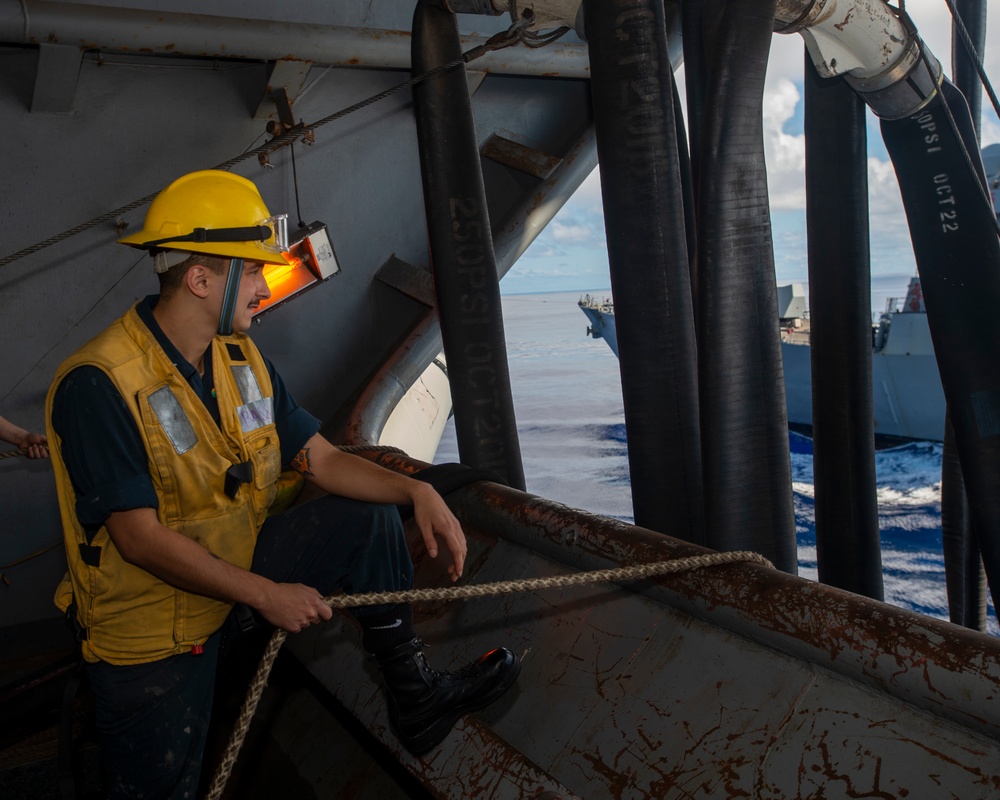 Sailor Observes Ship