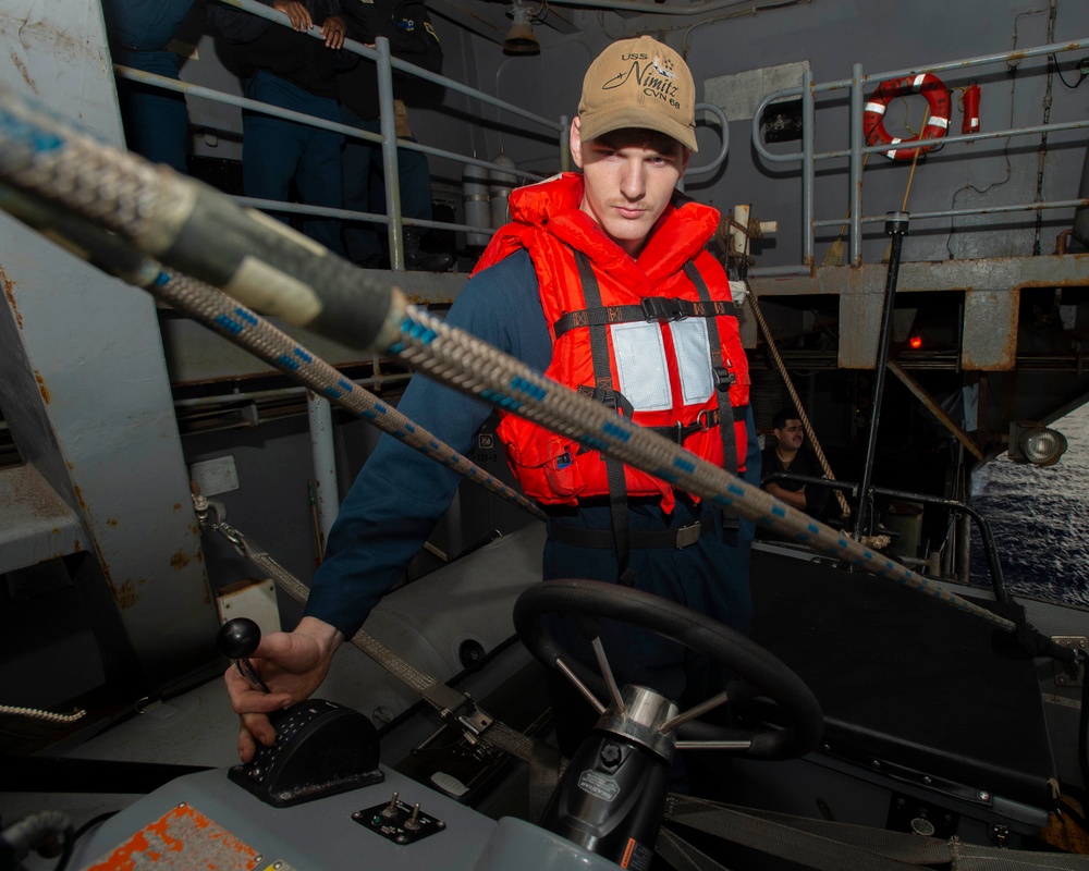 Sailor Tests Throttle Of A Boat