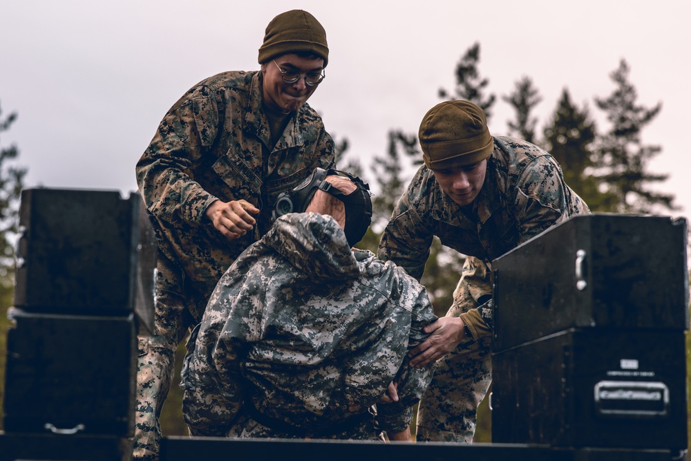 U.S. Marines conduct helicopter support team resupply with Finnish Soldiers