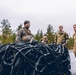 U.S. Marines conduct helicopter support team resupply with Finnish Soldiers