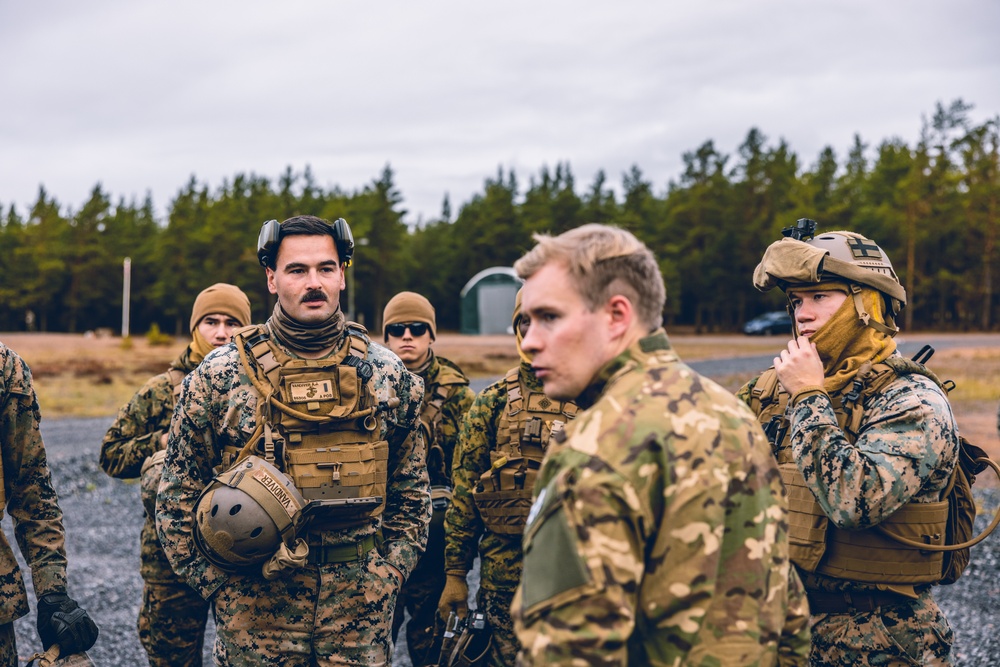 U.S. Marines conduct helicopter support team resupply with Finnish Soldiers