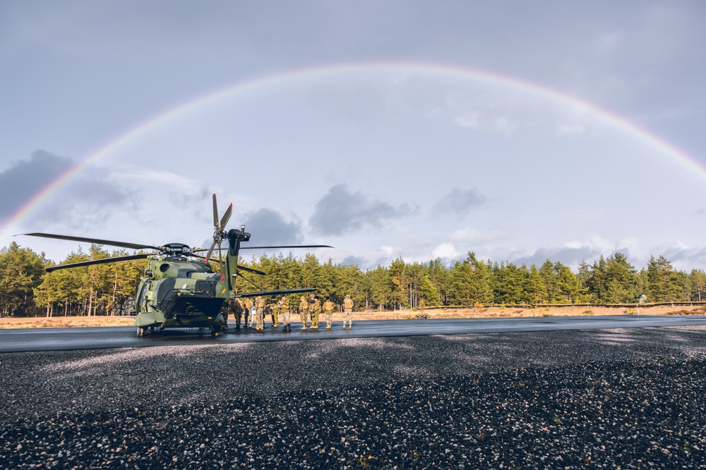 U.S. Marines conduct helicopter support team resupply with Finnish Soldiers