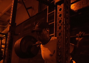 USS Ronald Reagan (CVN 76) Sailors compete in squat challenge
