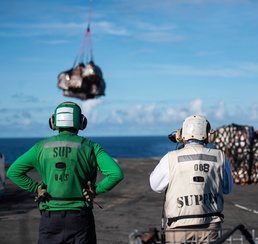 USS Ronald Reagan (CVN 76) conducts replenishment-at-sea with USNS Carl Brashear