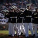 Marines with “The Silent Drill Platoon,” Marine Barracks Washington, perform for thousands of cadets and family members, during a Virginia Military Institute football game.