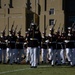 Marines with “The Silent Drill Platoon,” Marine Barracks Washington, perform for thousands of cadets and family members, during a Virginia Military Institute football game.