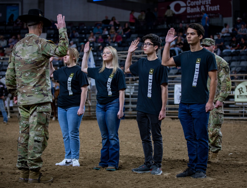 1st Infantry Division Commanding General's Mounted Color Guard participate in Professional Armed Forces Rodeo