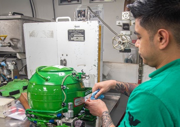 USS Ronald Reagan (CVN 76) Sailors test air regulators