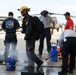 FEMA Urban Search and Rescue Go Through Decontamination At the Completion of the Daily Mission