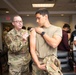 Photo of 116th Medical Group Airman administering flu vaccination to wing members