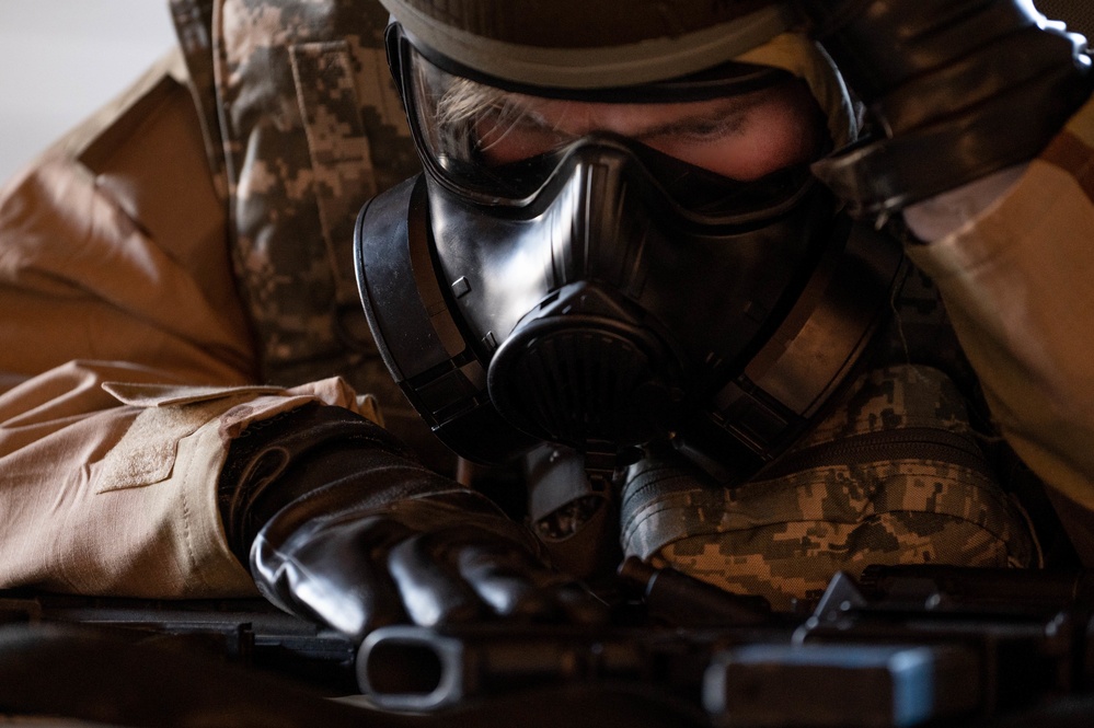 375th Air Mobility Wing Airmen rehearse mobility in MOPP 4 during Ballistic Badger 2022